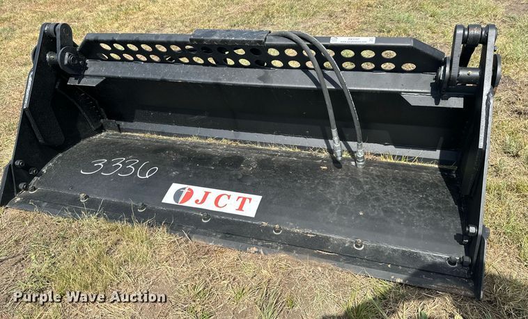 image for item DX1197 JCT Attachments four-in-one skid steer bucket