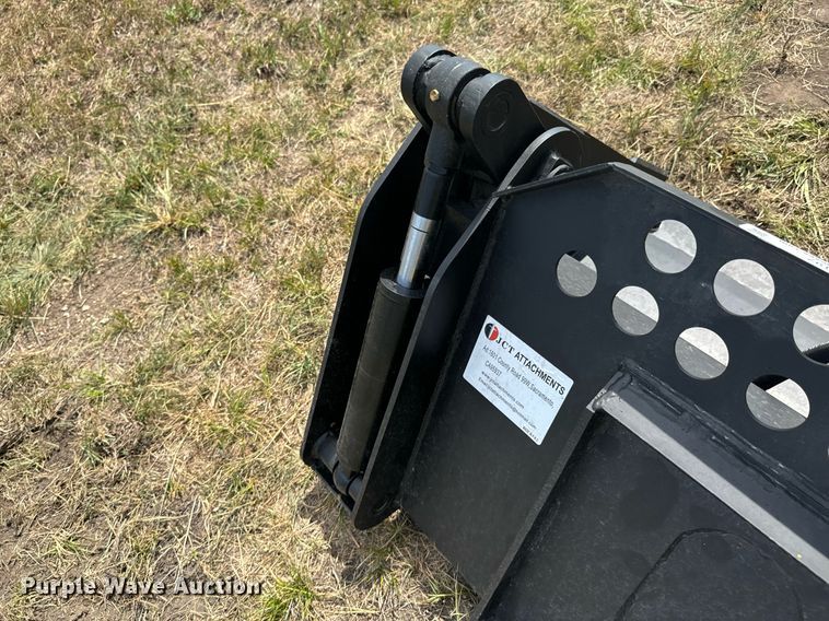 image for item DX1197 JCT Attachments four-in-one skid steer bucket