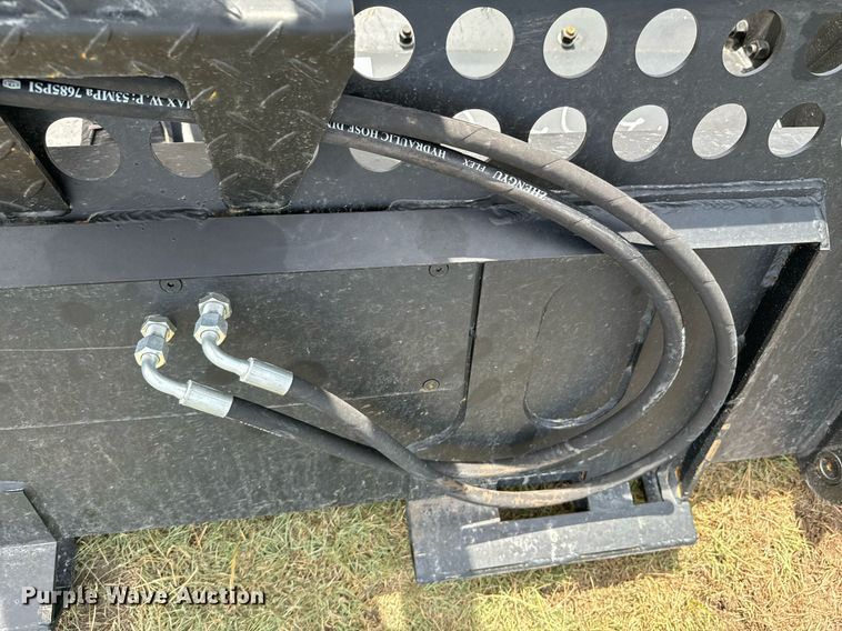 image for item DX1197 JCT Attachments four-in-one skid steer bucket