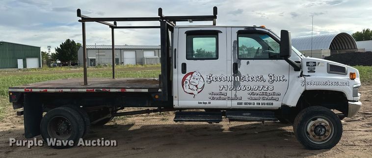 image for item LG9027 2005 GMC  C5500 Crew Cab flatbed truck