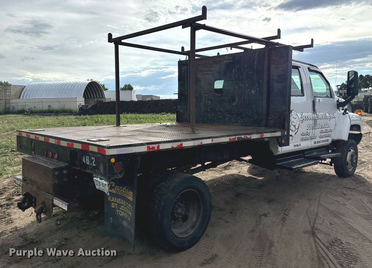 image for item LG9027 2005 GMC  C5500 Crew Cab flatbed truck