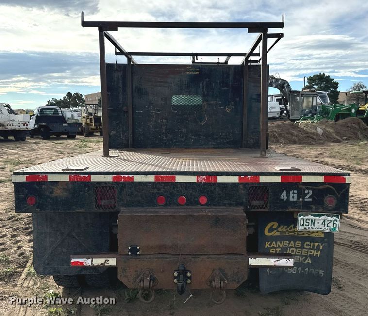 image for item LG9027 2005 GMC  C5500 Crew Cab flatbed truck