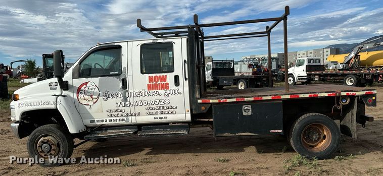 image for item LG9027 2005 GMC  C5500 Crew Cab flatbed truck