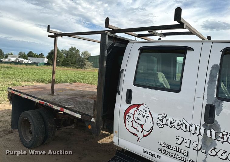 image for item LG9027 2005 GMC  C5500 Crew Cab flatbed truck