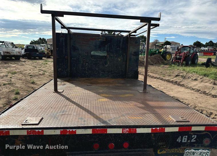 image for item LG9027 2005 GMC  C5500 Crew Cab flatbed truck