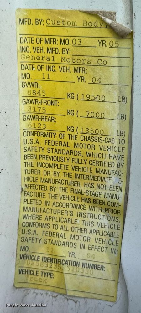 image for item LG9027 2005 GMC  C5500 Crew Cab flatbed truck