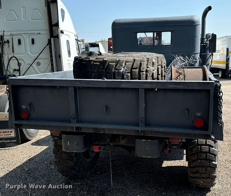 image for item MV9122 1985 AM General M35A3 flatbed truck