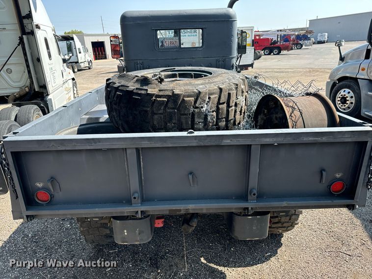 image for item MV9122 1985 AM General M35A3 flatbed truck