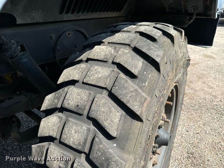 image for item MV9122 1985 AM General M35A3 flatbed truck