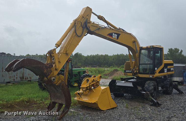 image for item DT5259 1996 Caterpillar M318 wheeled excavator