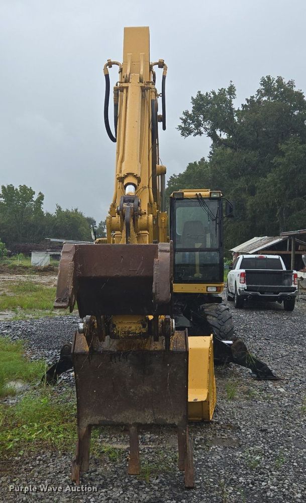 image for item DT5259 1996 Caterpillar M318 wheeled excavator