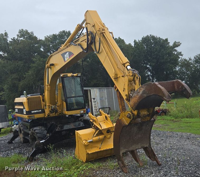 image for item DT5259 1996 Caterpillar M318 wheeled excavator