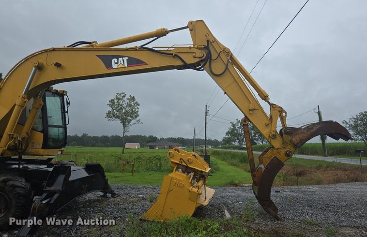 image for item DT5259 1996 Caterpillar M318 wheeled excavator