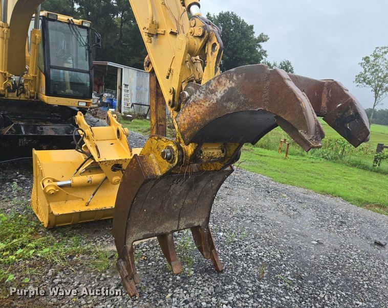 image for item DT5259 1996 Caterpillar M318 wheeled excavator