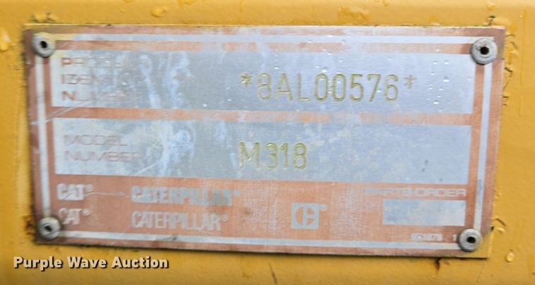 image for item DT5259 1996 Caterpillar M318 wheeled excavator