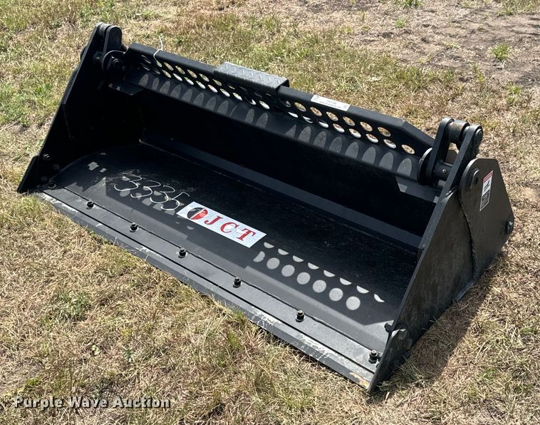 image for item DX1198 JCT Attachments four-in-one skid steer bucket