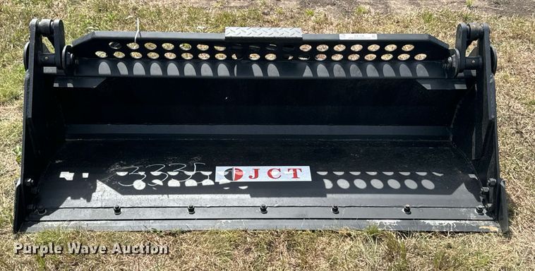 image for item DX1198 JCT Attachments four-in-one skid steer bucket