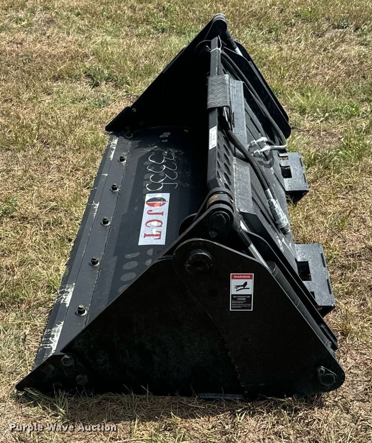 image for item DX1198 JCT Attachments four-in-one skid steer bucket