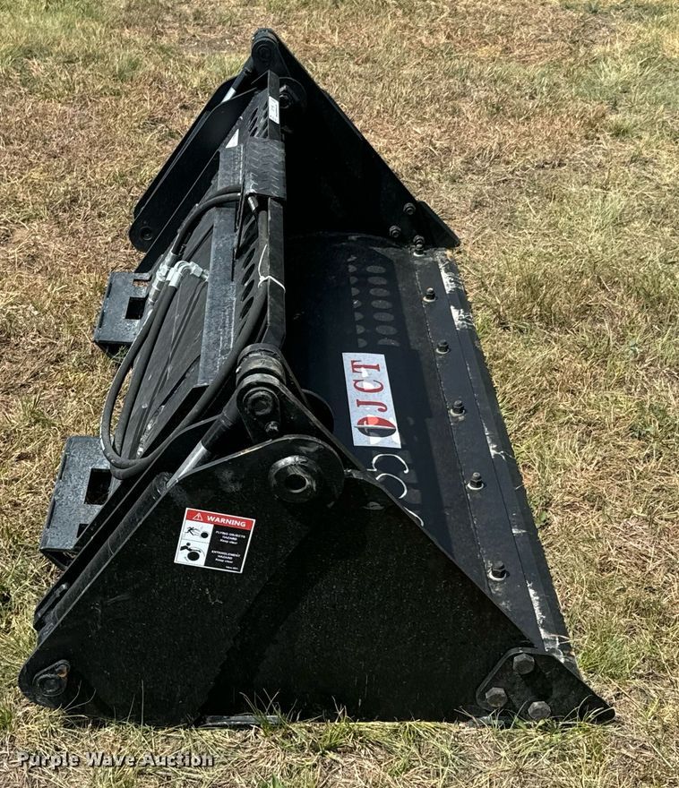 image for item DX1198 JCT Attachments four-in-one skid steer bucket