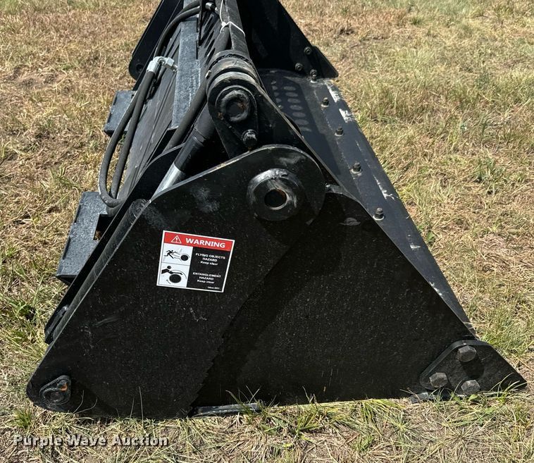 image for item DX1198 JCT Attachments four-in-one skid steer bucket