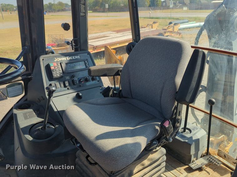 image for item EQ2090 2014 John Deere 310SK backhoe