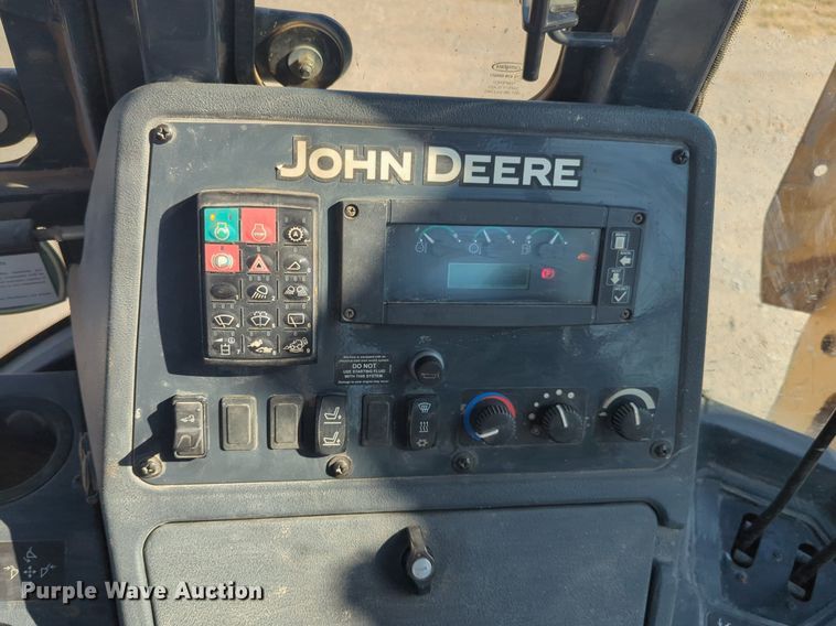 image for item EQ2090 2014 John Deere 310SK backhoe