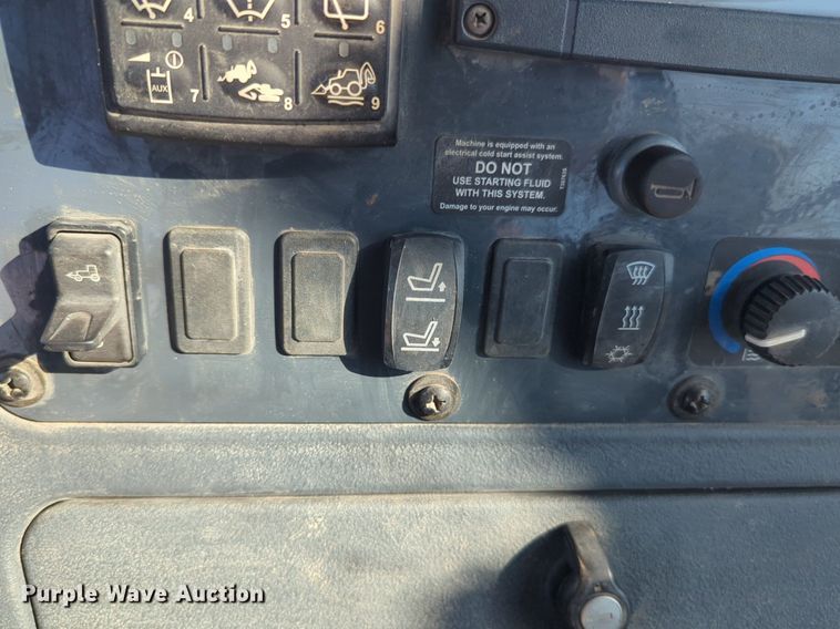 image for item EQ2090 2014 John Deere 310SK backhoe