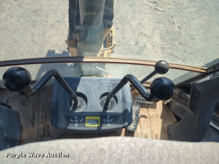 image for item EQ2090 2014 John Deere 310SK backhoe