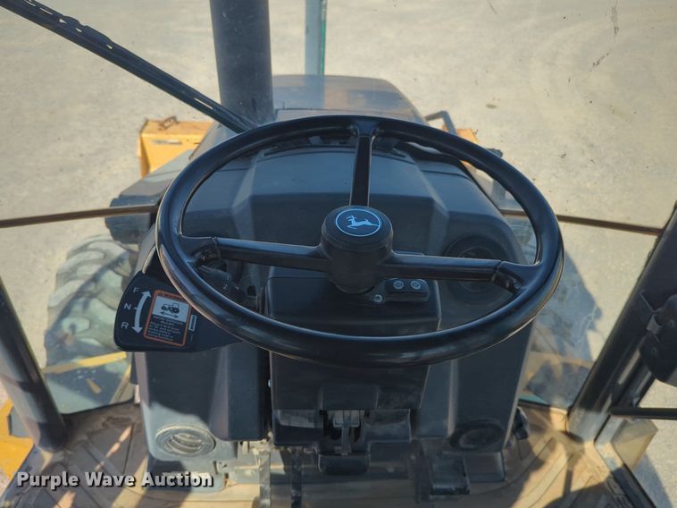 image for item EQ2090 2014 John Deere 310SK backhoe