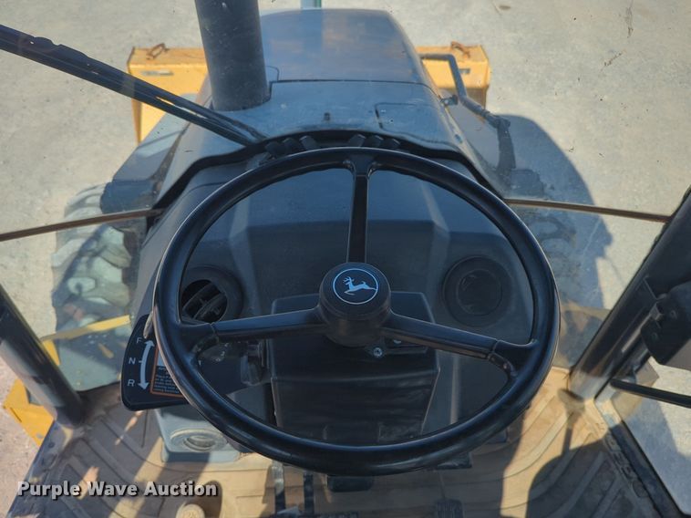 image for item EQ2090 2014 John Deere 310SK backhoe