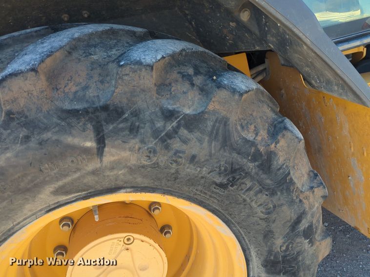 image for item EQ2090 2014 John Deere 310SK backhoe