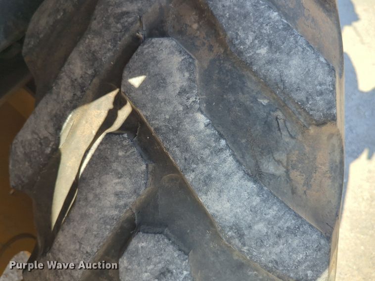 image for item EQ2090 2014 John Deere 310SK backhoe