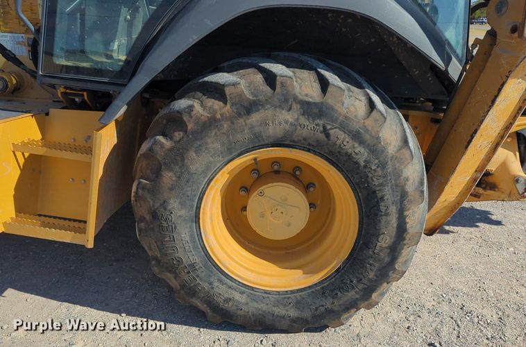 image for item EQ2090 2014 John Deere 310SK backhoe