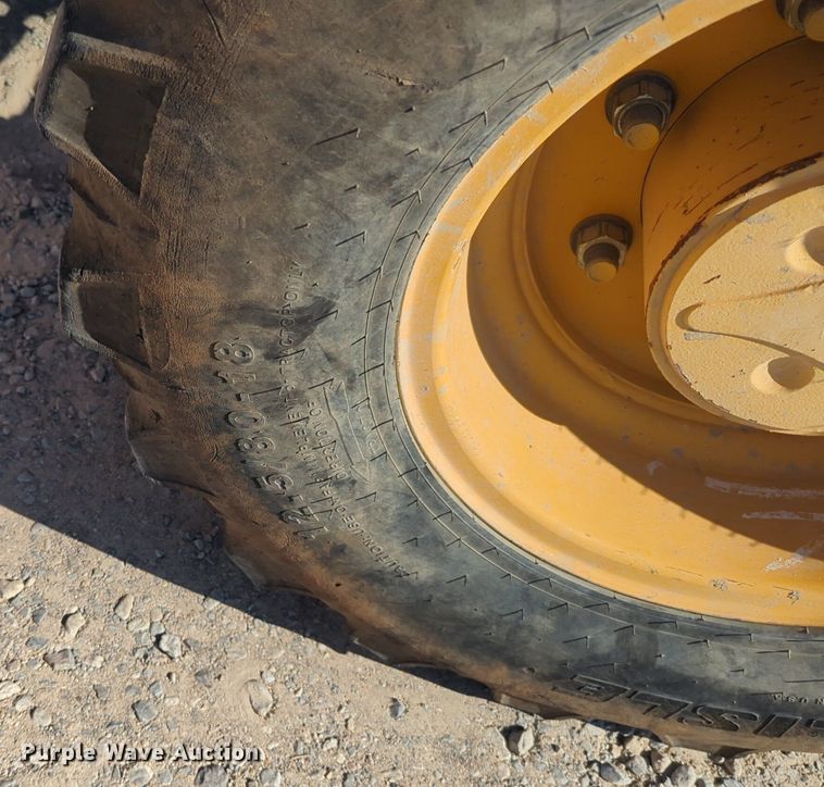 image for item EQ2090 2014 John Deere 310SK backhoe