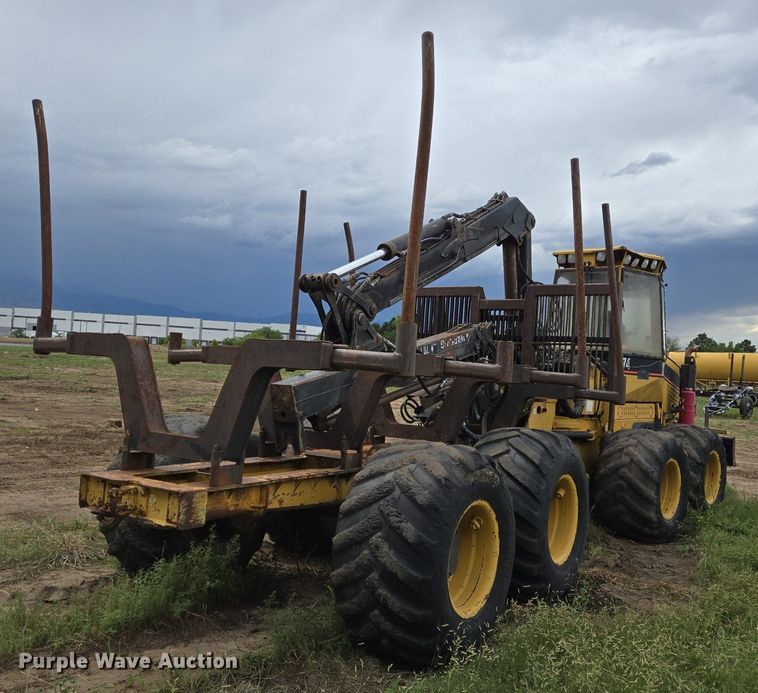 image for item LG9014 2001 Caterpillar 574 forwarder