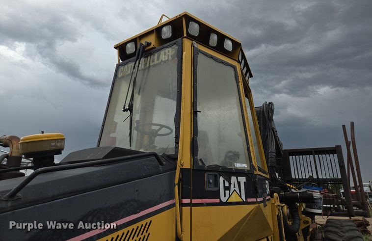 image for item LG9014 2001 Caterpillar 574 forwarder
