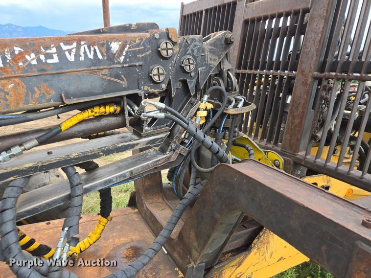 image for item LG9014 2001 Caterpillar 574 forwarder