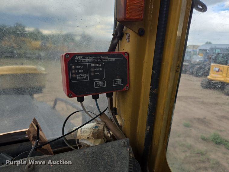 image for item LG9014 2001 Caterpillar 574 forwarder