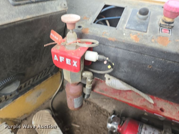 image for item LG9014 2001 Caterpillar 574 forwarder