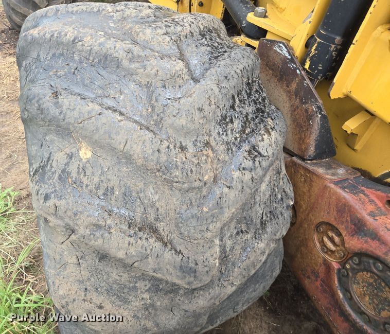 image for item LG9014 2001 Caterpillar 574 forwarder