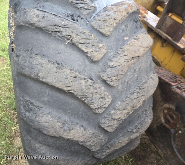 image for item LG9014 2001 Caterpillar 574 forwarder