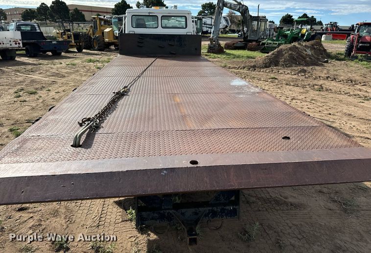 image for item LG9029 2001 Freightliner  FL70 dump flatbed truck