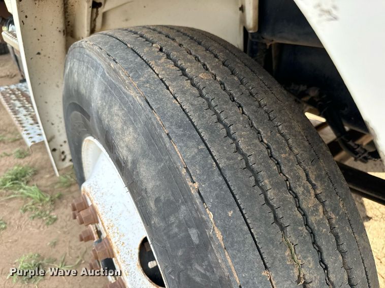 image for item LG9029 2001 Freightliner  FL70 dump flatbed truck