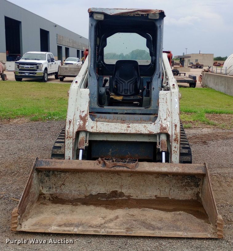 image for item NY9333 Takeuchi TL140 tracked skid steer loader