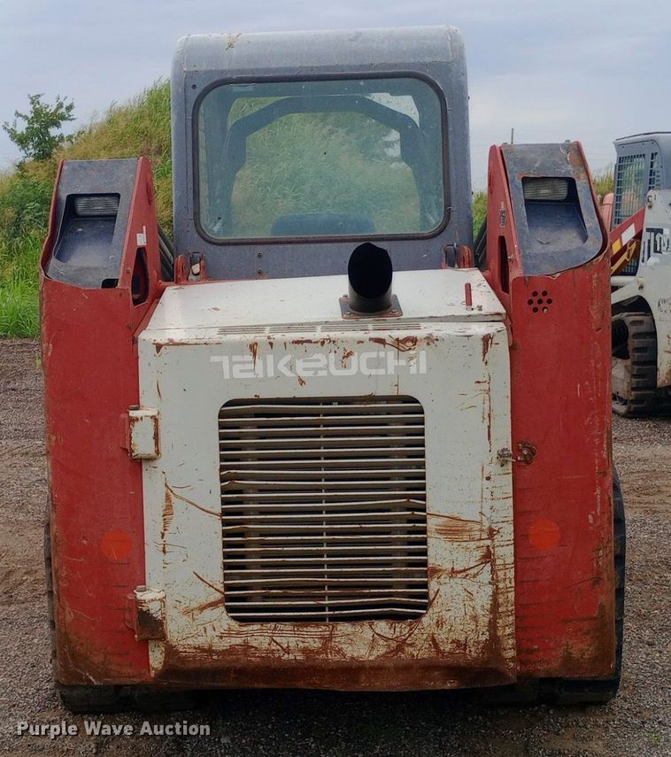image for item NY9333 Takeuchi TL140 tracked skid steer loader