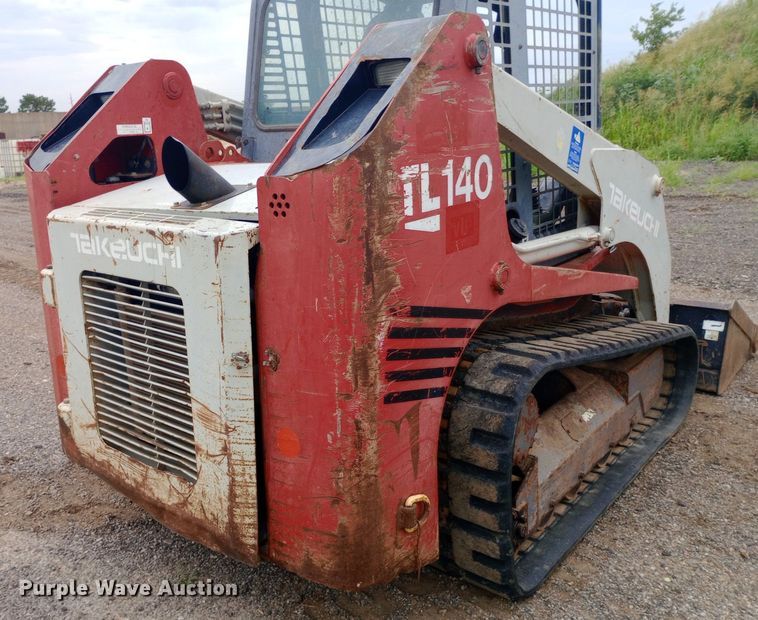 image for item NY9333 Takeuchi TL140 tracked skid steer loader