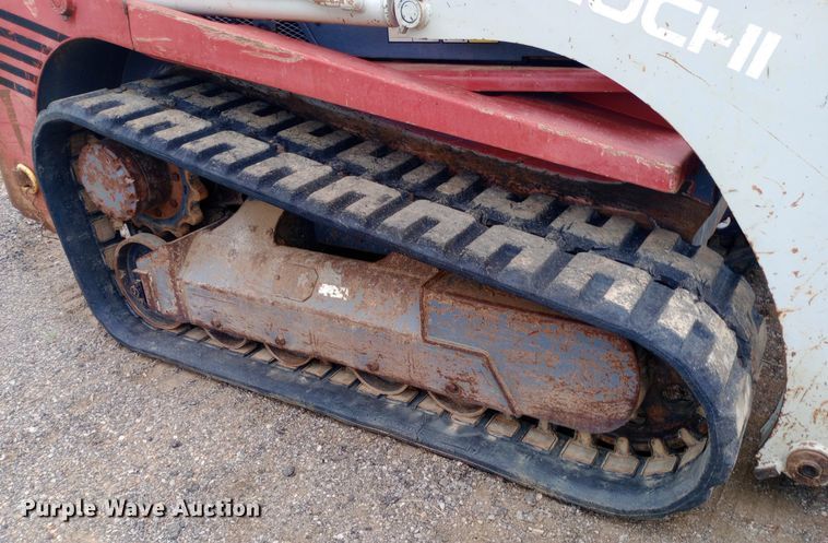 image for item NY9333 Takeuchi TL140 tracked skid steer loader
