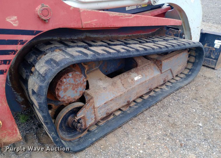 image for item NY9333 Takeuchi TL140 tracked skid steer loader