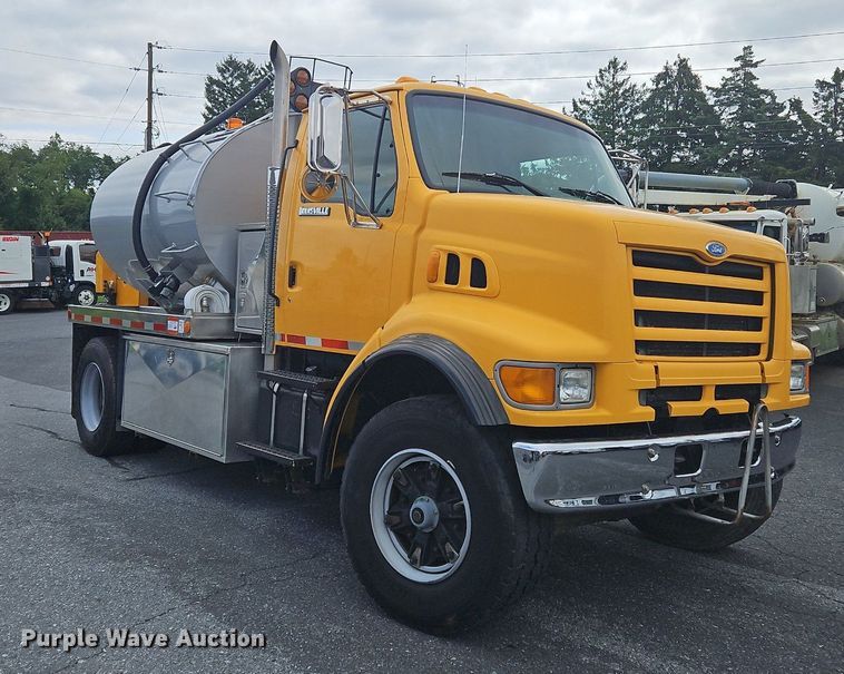 image for item OJ9812 1997 Ford Louisville  sewer jetter truck