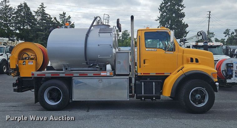 image for item OJ9812 1997 Ford Louisville  sewer jetter truck